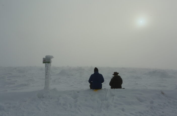 Hikers sitting on the Brocken